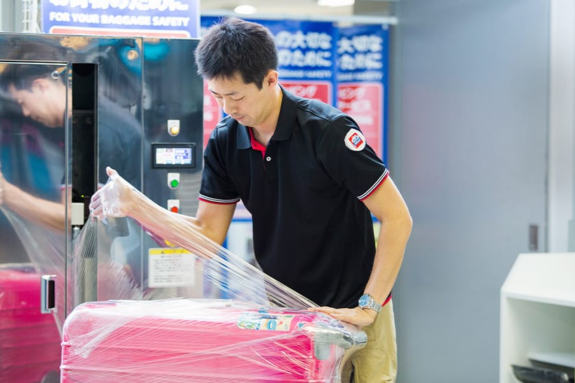Baggage wrapping business image